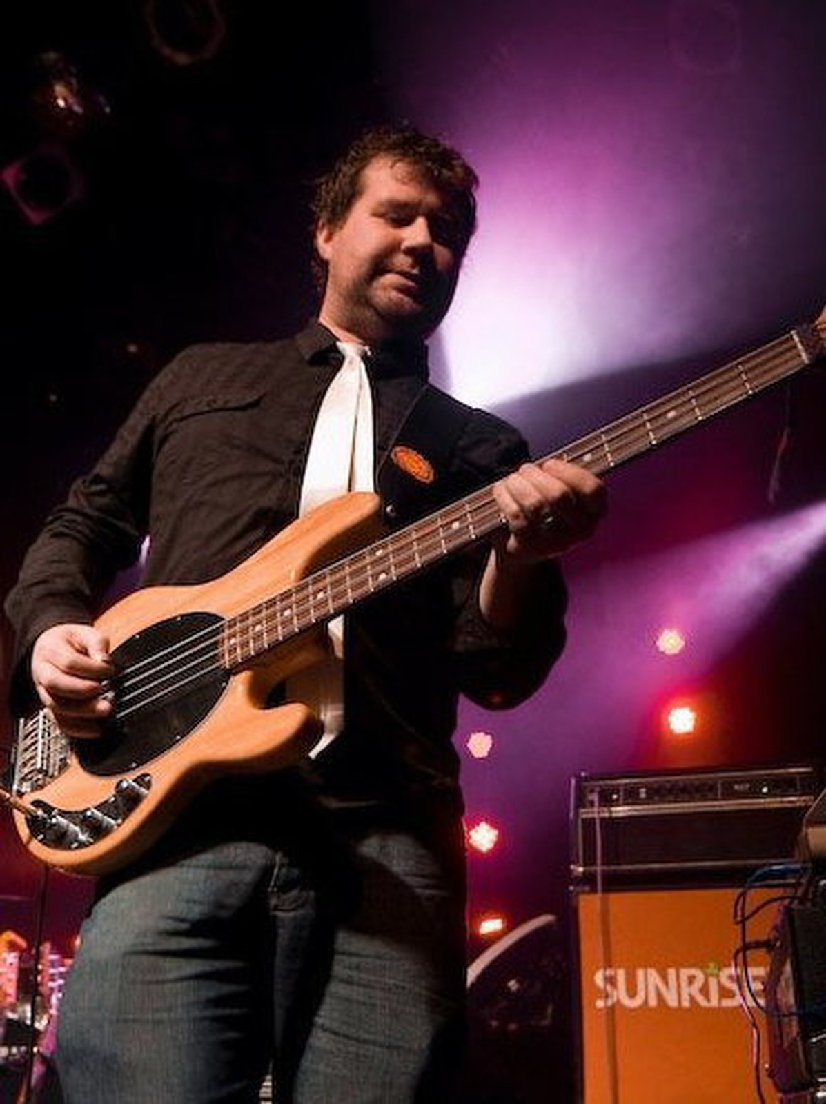 Declan Loughlin performing live on bass